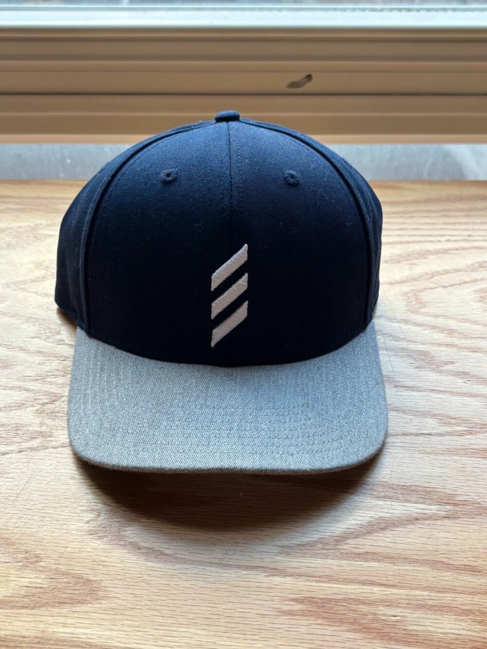 Black and Gray Abstract Logo Snapback Hat